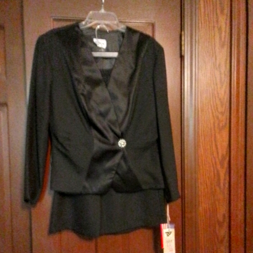 Tuxedo style black pantsuit with rhinestone buttons. Size 12